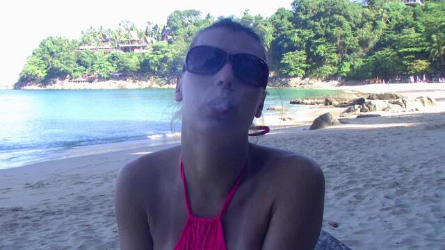 Smoking im Swimsuit on the Beach
