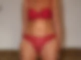 Posing einer Mature in roter Wäsche - Bild 6 von 49