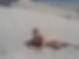 Nackt am Strand - Bild 6 von 17